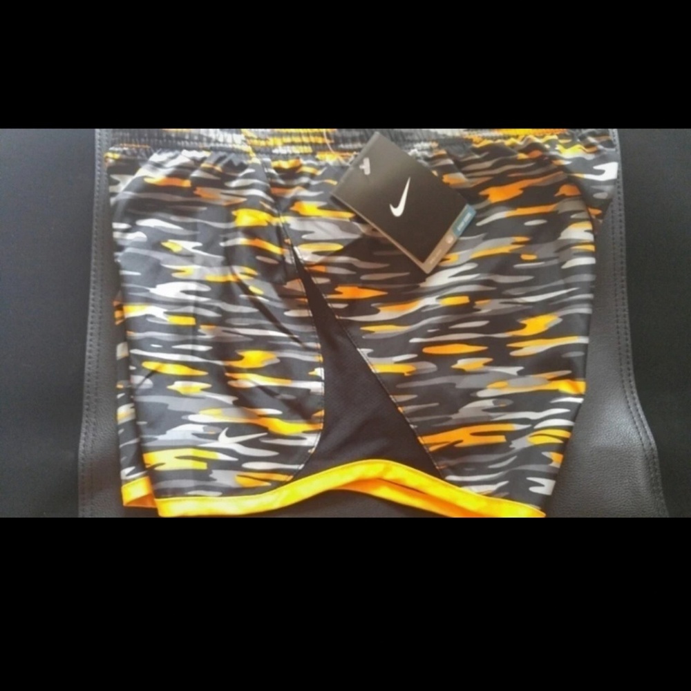 Orange and black camo nike shorts